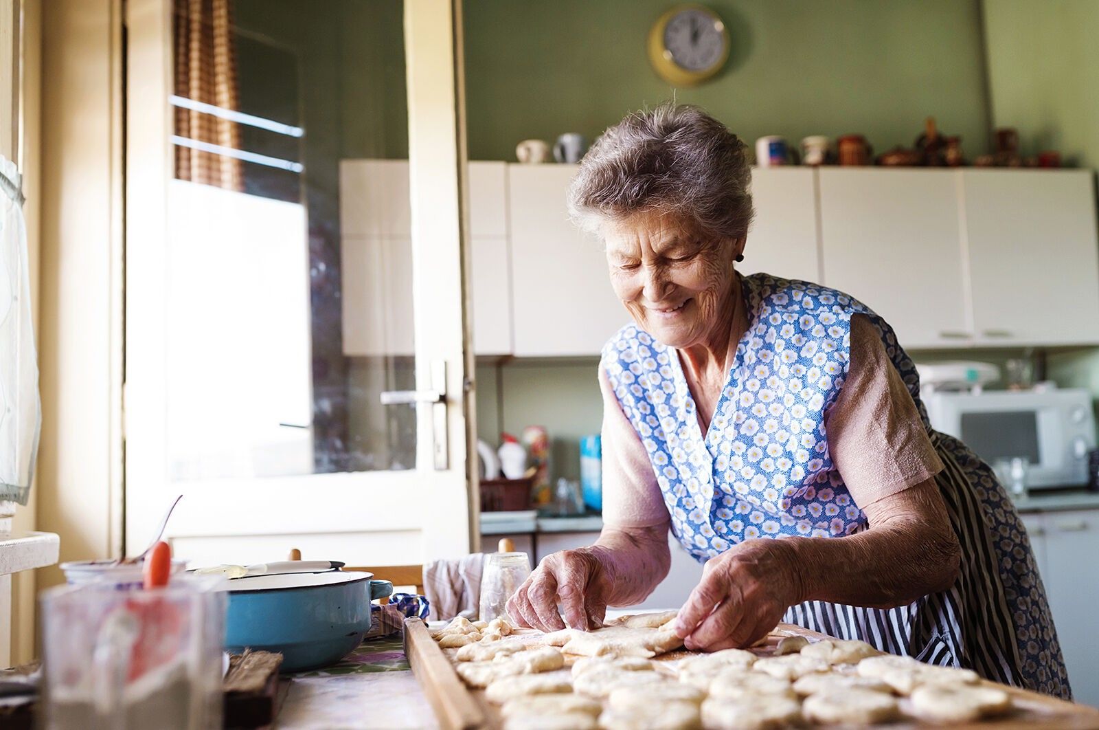 Senior woman baking